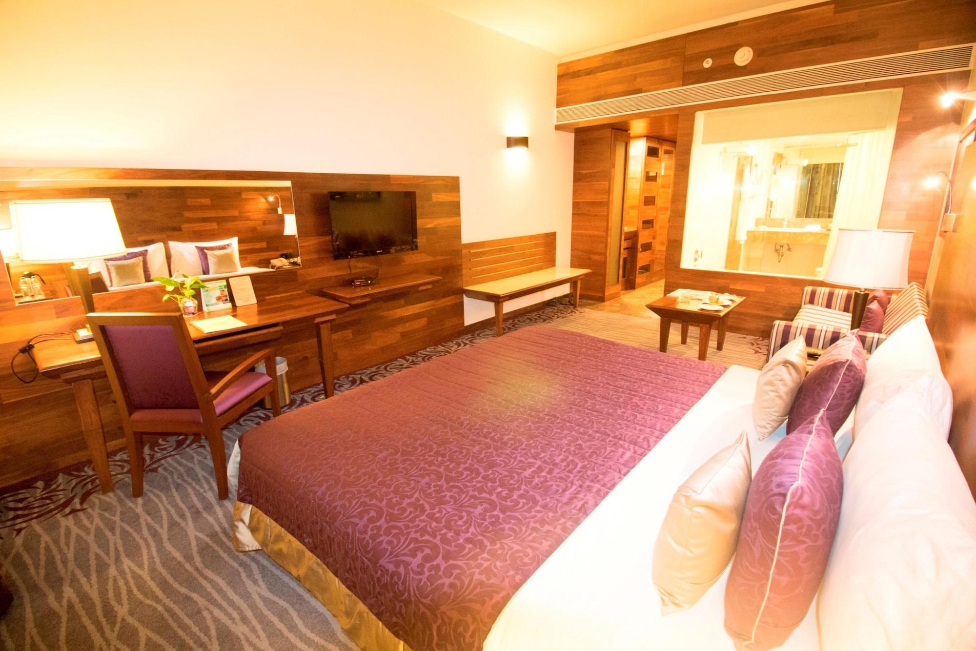 The Orchid Hotel Hinjewadi Pune Esterno foto A room at the hotel