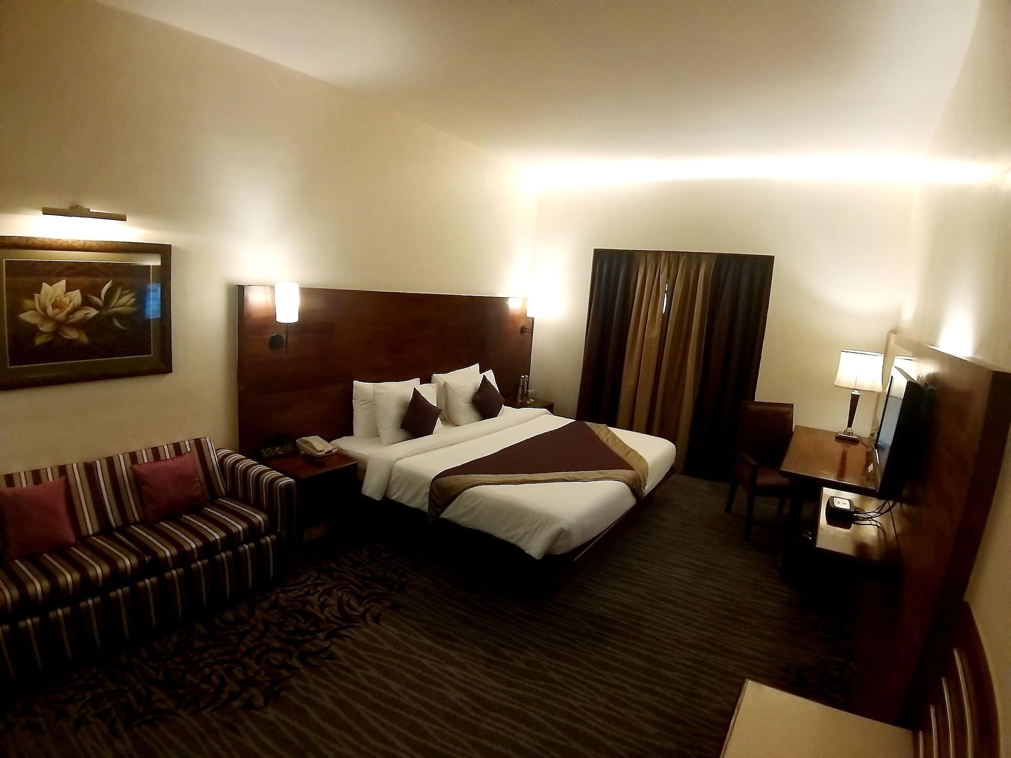 The Orchid Hotel Hinjewadi Pune Esterno foto A room at the hotel