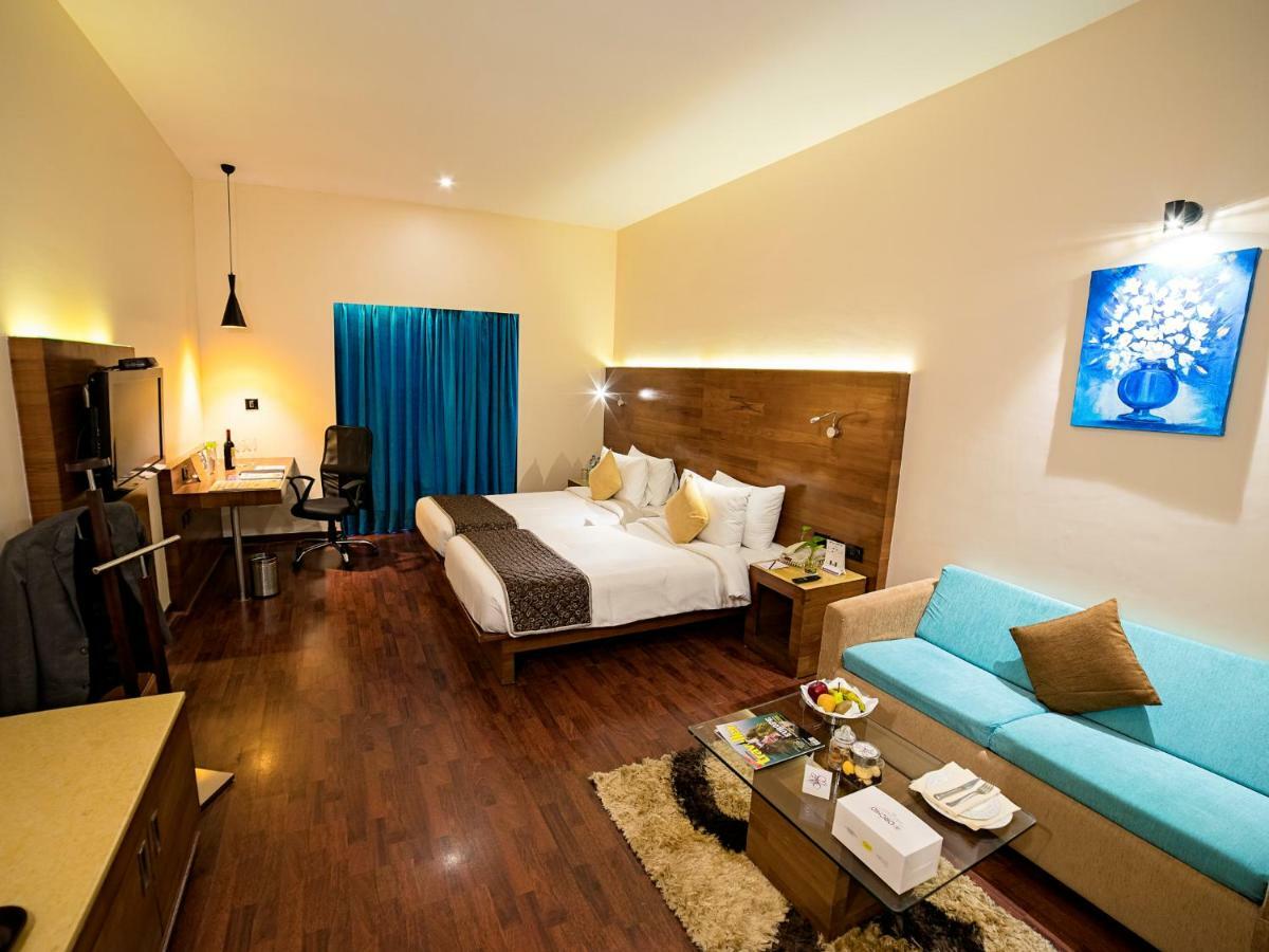 The Orchid Hotel Hinjewadi Pune Esterno foto A room at the hotel